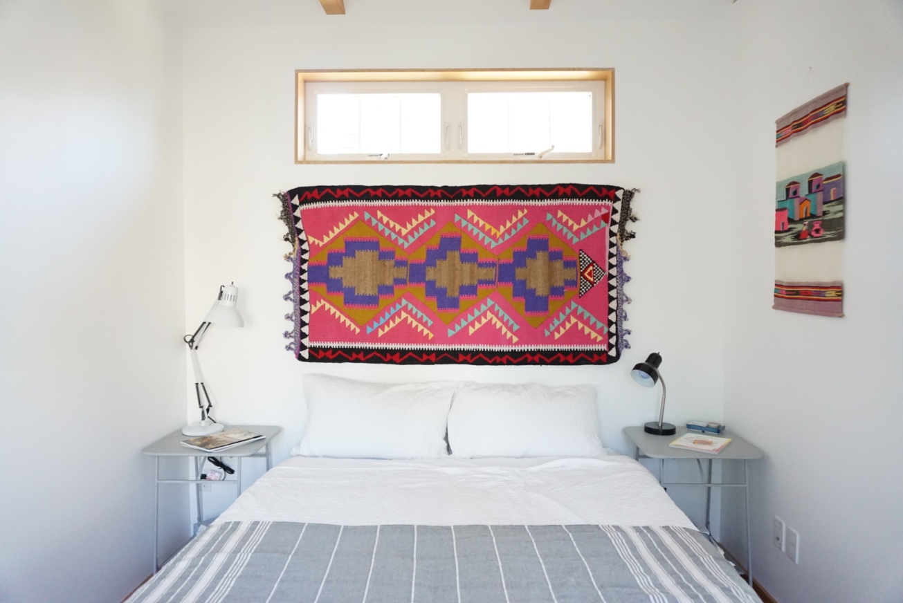 Patterned Rugs at A Headboard